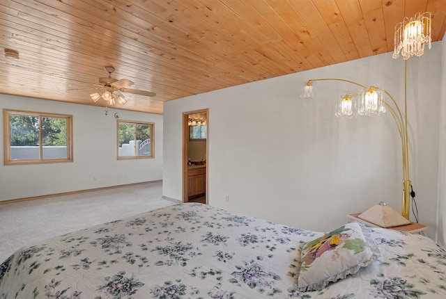 71 Apache Plume Dr, Santa Fe, NM 87508 - carpeted bedroom with a chandelier, wood ceiling, and baseboards