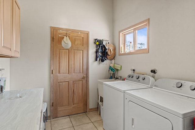 71 Apache Plume Dr, Santa Fe, NM 87508 - washroom with cabinet space, washer and dryer, and light tile patterned floors