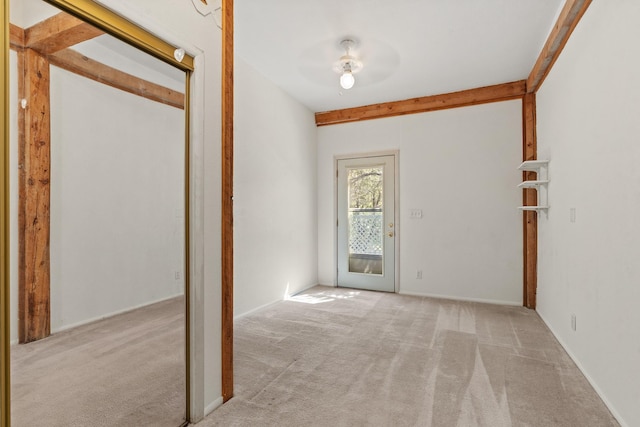 71 Apache Plume Dr, Santa Fe, NM 87508 - empty room with carpet and beam ceiling