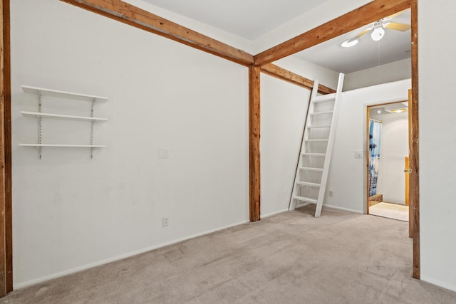 71 Apache Plume Dr, Santa Fe, NM 87508 - below grade area featuring carpet, a ceiling fan, and baseboards