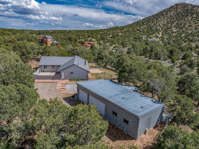 71 Apache Plume Dr, Santa Fe, NM 87508 - view of subject property featuring a heavily wooded area