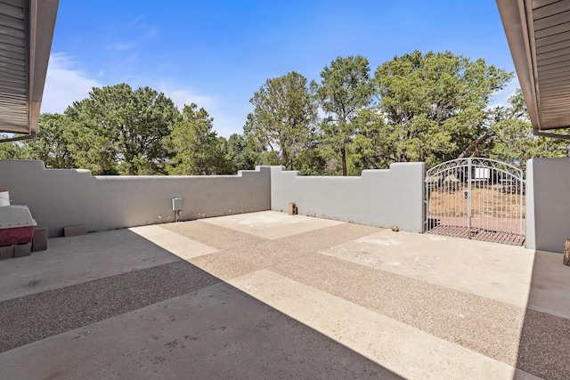 71 Apache Plume Dr, Santa Fe, NM 87508 - view of patio with a gate