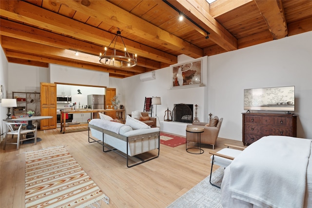 749 Alto St Unit A, Santa Fe, NM 87501 - living room featuring light wood-style flooring, wooden ceiling with exposed beams, a chandelier, and an AC wall unit