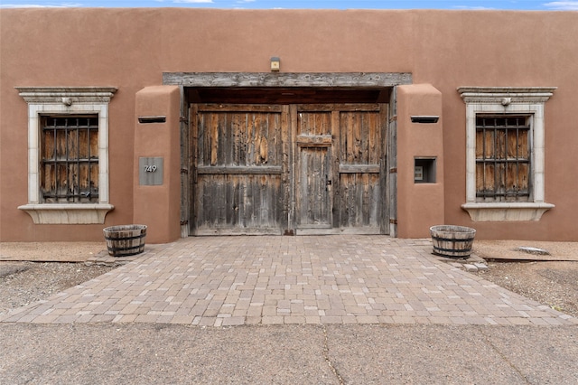 749 Alto St Unit A, Santa Fe, NM 87501 - property entrance with a gate and driveway