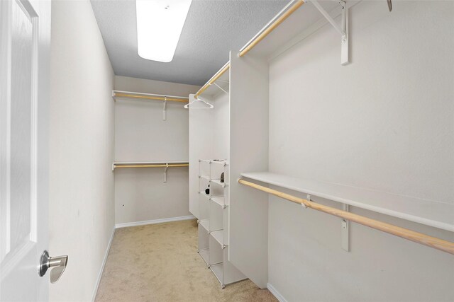 2613 Camino Catalonia, Rio Rancho, NM 87124 - spacious closet featuring light carpet