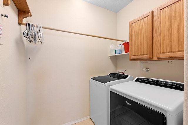 2613 Camino Catalonia, Rio Rancho, NM 87124 - laundry room featuring washing machine and dryer and cabinet space