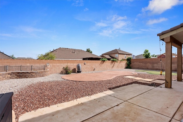 2613 Camino Catalonia, Rio Rancho, NM 87124 - fenced backyard with a patio area