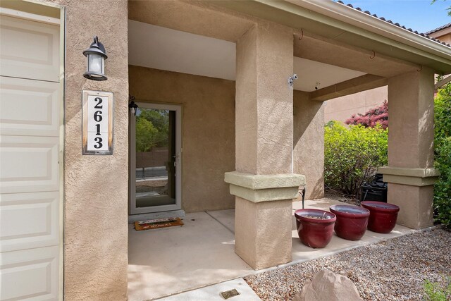 2613 Camino Catalonia, Rio Rancho, NM 87124 - property entrance featuring stucco siding
