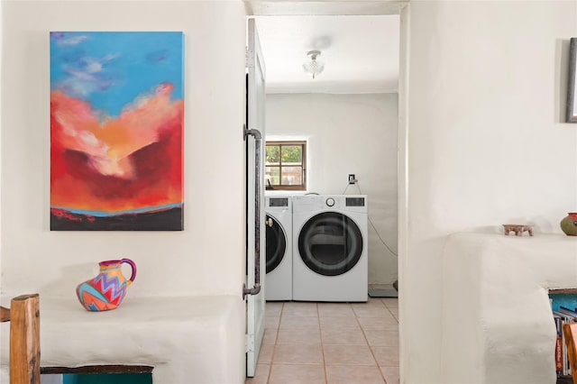 3 Waldo, Cerrillos, NM 87010 - washroom featuring washing machine and dryer and light tile patterned flooring