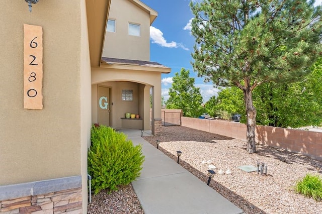 6280 Nardos Rd NW, Albuquerque, NM 87114 - property entrance with stucco siding