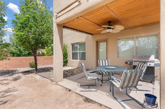 6280 Nardos Rd NW, Albuquerque, NM 87114 - view of patio with a ceiling fan, outdoor dining space, and grilling area