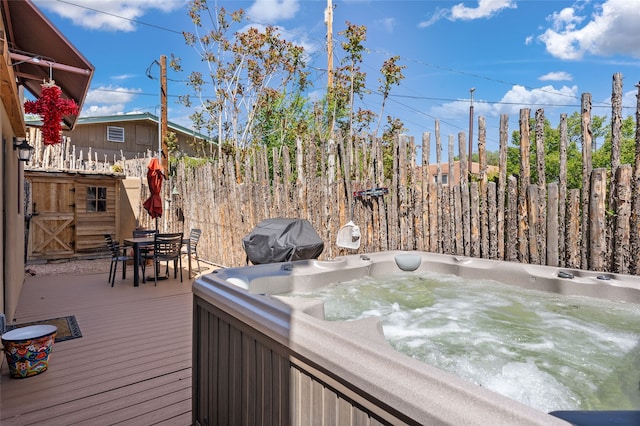 505 Juniper Dr Unit B, Santa Fe, NM 87501 - wooden terrace with a hot tub, grilling area, and outdoor dining space