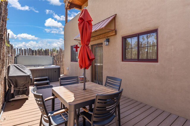 505 Juniper Dr Unit B, Santa Fe, NM 87501 - wooden terrace with a hot tub, outdoor dining area, and area for grilling