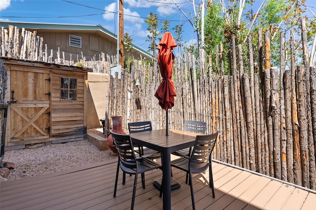 505 Juniper Dr Unit B, Santa Fe, NM 87501 - wooden deck with outdoor dining area