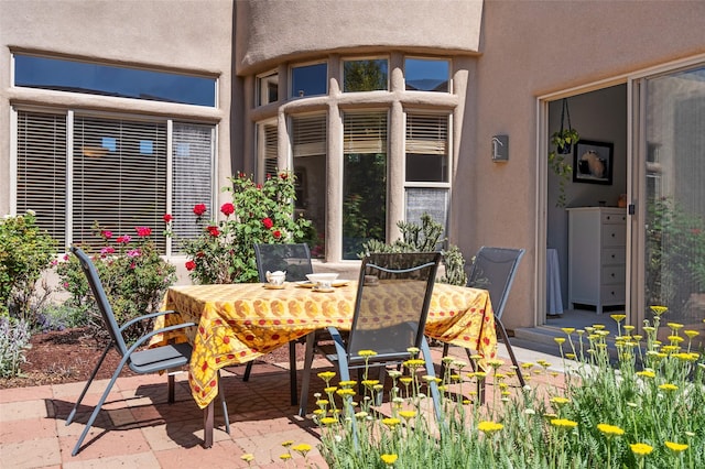 15 Cimarron Pass, Santa Fe, NM 87508 - view of patio / terrace with outdoor dining area