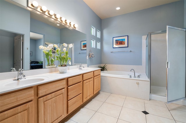 15 Cimarron Pass, Santa Fe, NM 87508 - bathroom with double vanity, a garden tub, tile patterned floors, and a stall shower