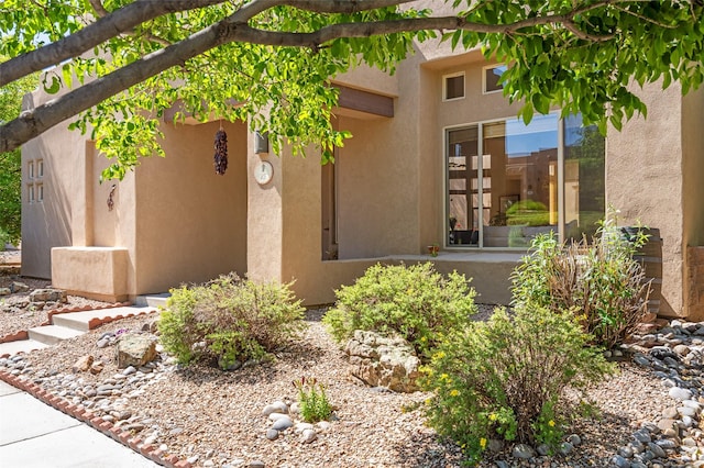 15 Cimarron Pass, Santa Fe, NM 87508 - view of property exterior with stucco siding