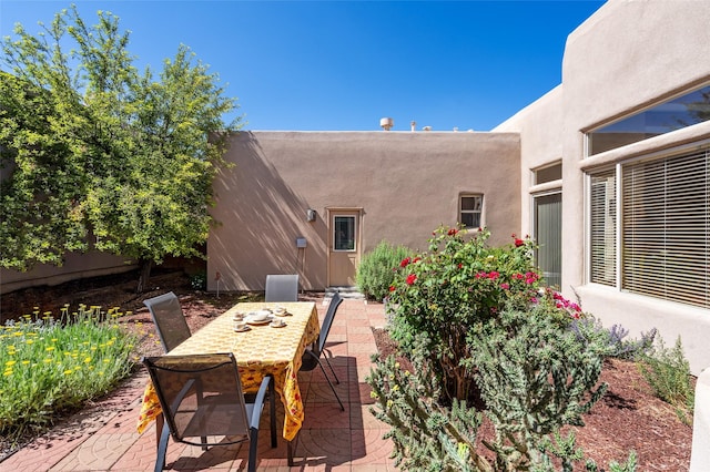 15 Cimarron Pass, Santa Fe, NM 87508 - view of patio featuring outdoor dining area