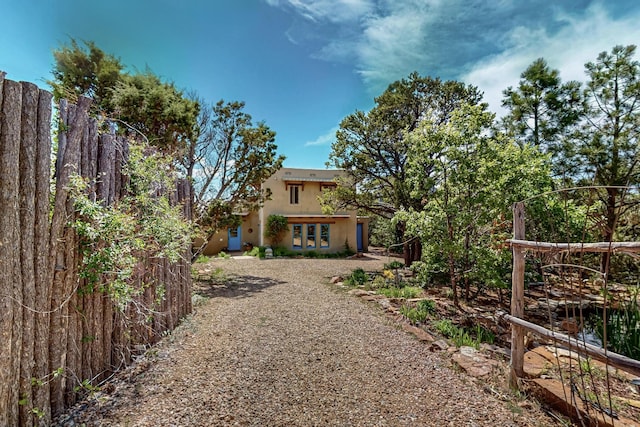 97 Quartz Trl, Santa Fe, NM 87505 - rear view of house featuring french doors