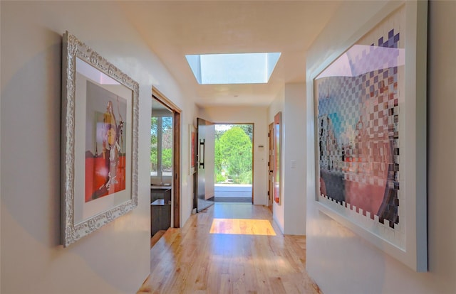 974 Old Santa Fe Trl, Santa Fe, NM 87505 - hallway featuring a skylight and wood finished floors