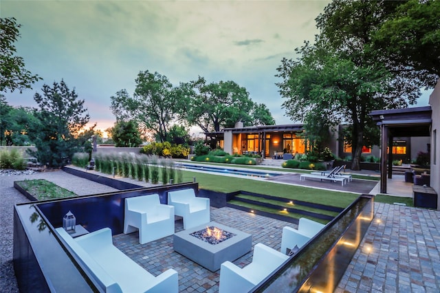 974 Old Santa Fe Trl, Santa Fe, NM 87505 - view of swimming pool featuring a patio and an outdoor living space with a fire pit