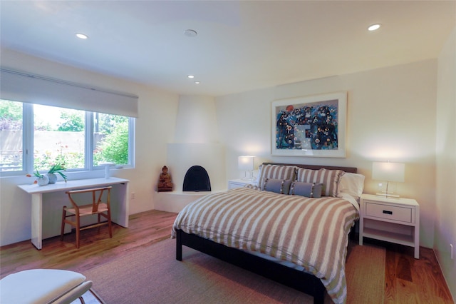 974 Old Santa Fe Trl, Santa Fe, NM 87505 - bedroom with wood finished floors and recessed lighting