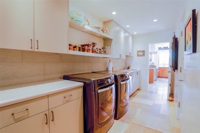 974 Old Santa Fe Trl, Santa Fe, NM 87505 - laundry area with washing machine and clothes dryer, recessed lighting, and cabinet space