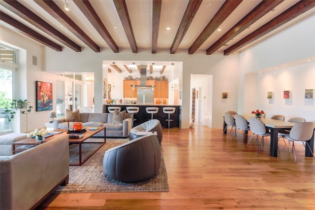 974 Old Santa Fe Trl, Santa Fe, NM 87505 - living room with light wood-style flooring, beam ceiling, and recessed lighting