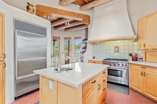 17 Alteza, Santa Fe, NM 87508 - kitchen with high end appliances, light brown cabinets, brick floors, a wooden ceiling with exposed beams, and tasteful backsplash