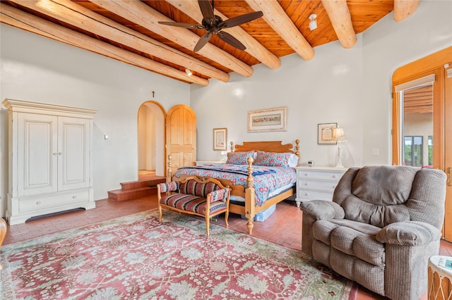 17 Alteza, Santa Fe, NM 87508 - bedroom with arched walkways, a wood ceiling with exposed beams, and ceiling fan