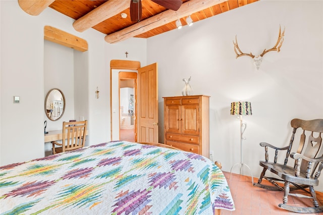 17 Alteza, Santa Fe, NM 87508 - bedroom featuring a wood ceiling with exposed beams