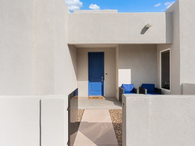 2324 Venada Rd, Rio Rancho, NM 87144 - property entrance with stucco siding