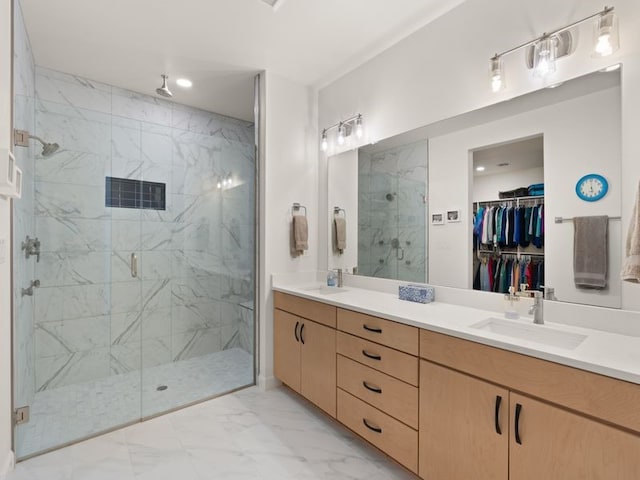 2324 Venada Rd, Rio Rancho, NM 87144 - bathroom with marble finish flooring, a marble finish shower, double vanity, a walk in closet, and recessed lighting