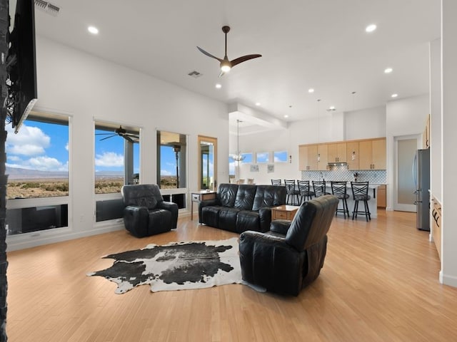 2324 Venada Rd, Rio Rancho, NM 87144 - living area with a ceiling fan, light wood-style flooring, healthy amount of natural light, and recessed lighting