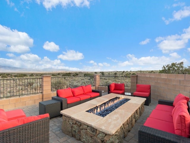 2324 Venada Rd, Rio Rancho, NM 87144 - view of patio with an outdoor living space with a fire pit