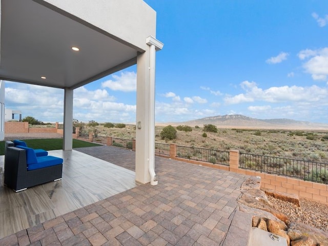 2324 Venada Rd, Rio Rancho, NM 87144 - view of patio with a mountain view