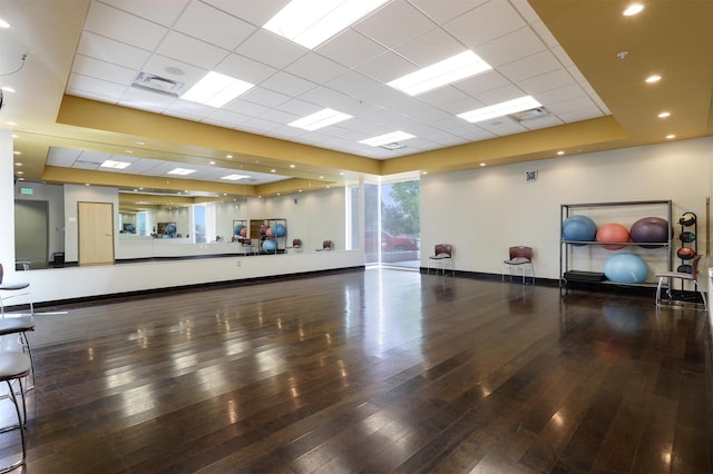 2324 Venada Rd, Rio Rancho, NM 87144 - workout room featuring wood-type flooring, a paneled ceiling, and a tray ceiling