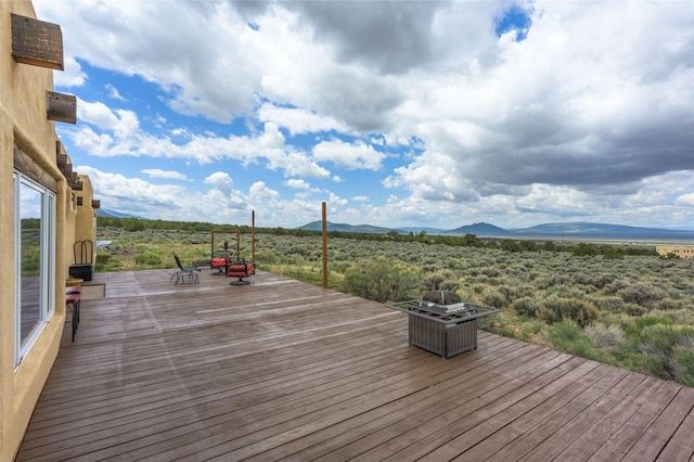 131 Quintana Rd, Questa, NM 87556 - deck with a mountain view