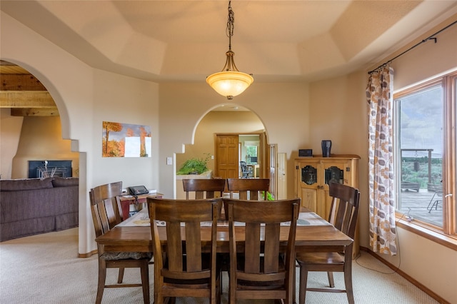 131 Quintana Rd, Questa, NM 87556 - dining space with light carpet and arched walkways