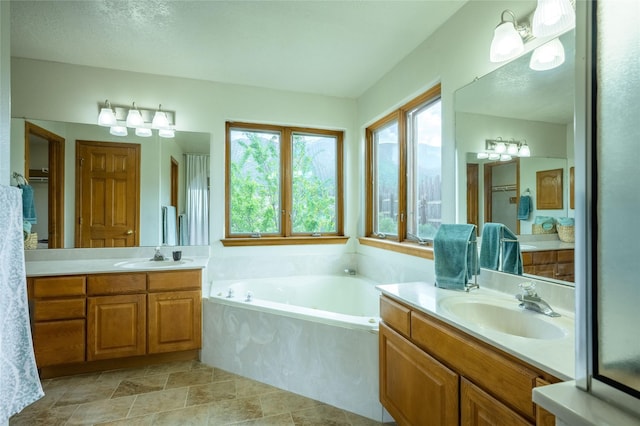 131 Quintana Rd, Questa, NM 87556 - full bathroom with two vanities and a bath