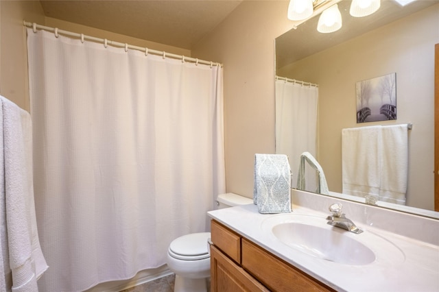 131 Quintana Rd, Questa, NM 87556 - bathroom featuring toilet and vanity
