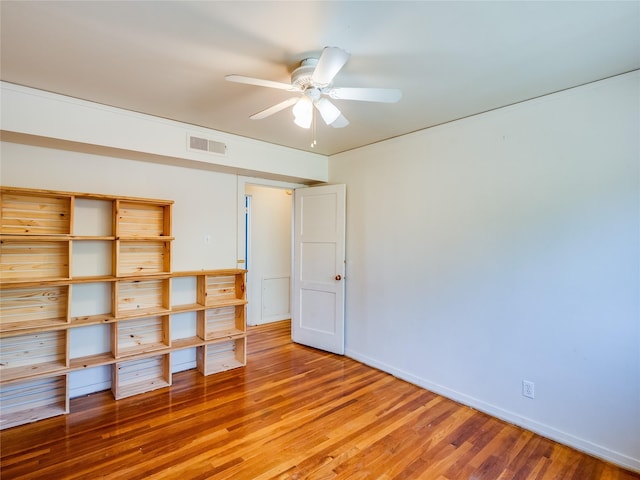 2148 33rd St Unit B, Los Alamos, NM 87544 - unfurnished bedroom featuring light wood-style flooring and ceiling fan