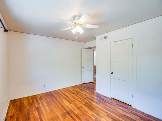 2148 33rd St Unit B, Los Alamos, NM 87544 - unfurnished bedroom with light wood-type flooring and a ceiling fan