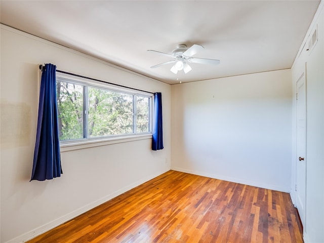2148 33rd St Unit B, Los Alamos, NM 87544 - unfurnished room featuring wood finished floors and ceiling fan