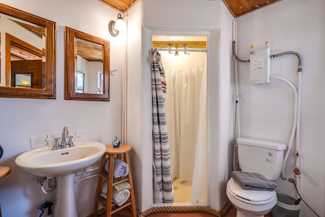7675 Old Santa Fe Unit C, Santa Fe, NM 87505 - full bathroom with a shower stall and toilet