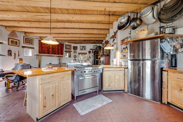 7675 Old Santa Fe Unit C, Santa Fe, NM 87505 - kitchen featuring appliances with stainless steel finishes, brick flooring, a wood ceiling with exposed beams, light brown cabinetry, and butcher block countertops