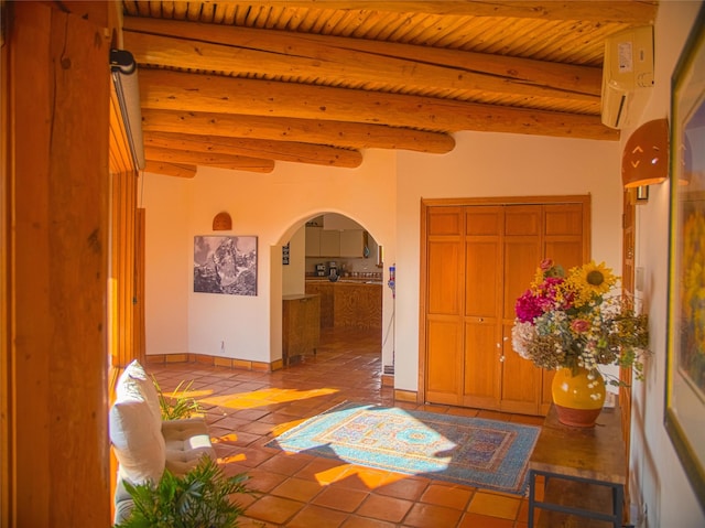 7 Paseo De Rincon, Santa Fe, NM 87508 - hall featuring arched walkways, tile patterned flooring, and a wooden ceiling with exposed beams