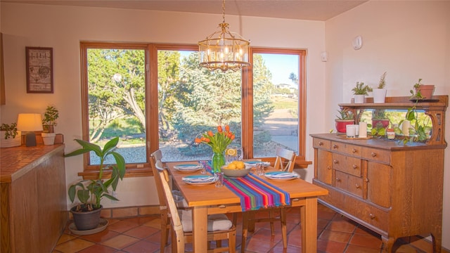 7 Paseo De Rincon, Santa Fe, NM 87508 - dining area featuring tile patterned flooring and a chandelier