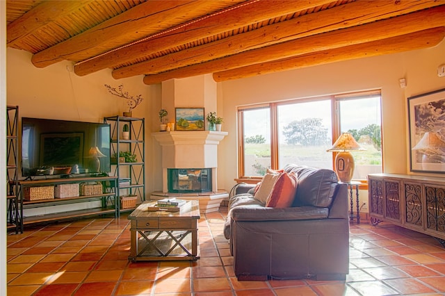 7 Paseo De Rincon, Santa Fe, NM 87508 - living area with tile patterned flooring, a wood ceiling with exposed beams, and a glass covered fireplace