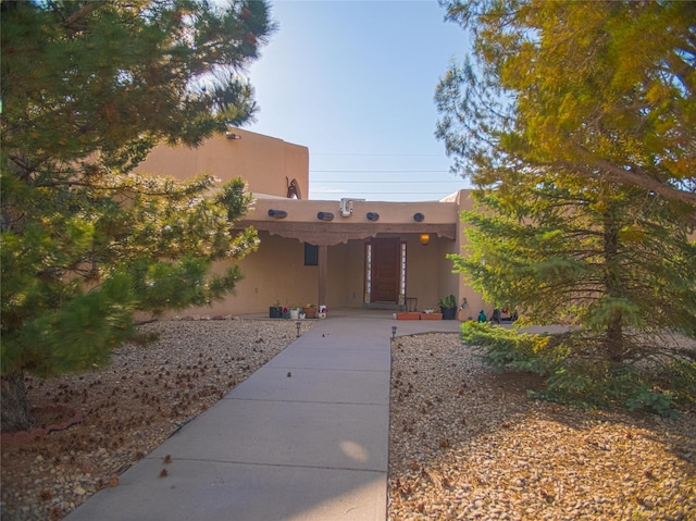7 Paseo De Rincon, Santa Fe, NM 87508 - view of front of home with stucco siding